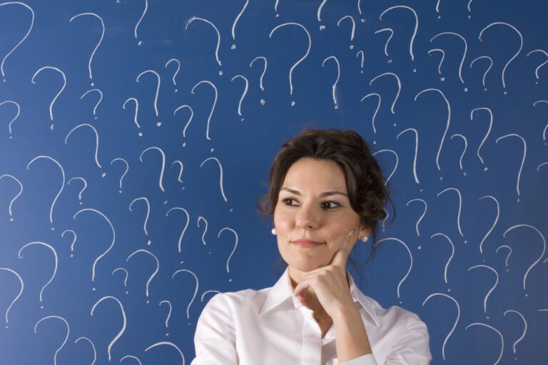 A mentor coach weighing the questions ahead